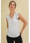 Blusa de lurex con cuello en "V" y volados en mangas