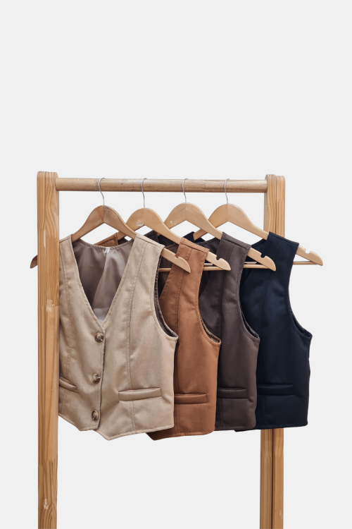 Chaleco de suede forrado con bolsillos falsos y botones