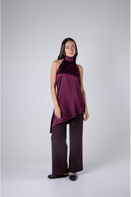 Blusa de satén evasé escote halter con lazo, espalda baja y terminación asimétrica