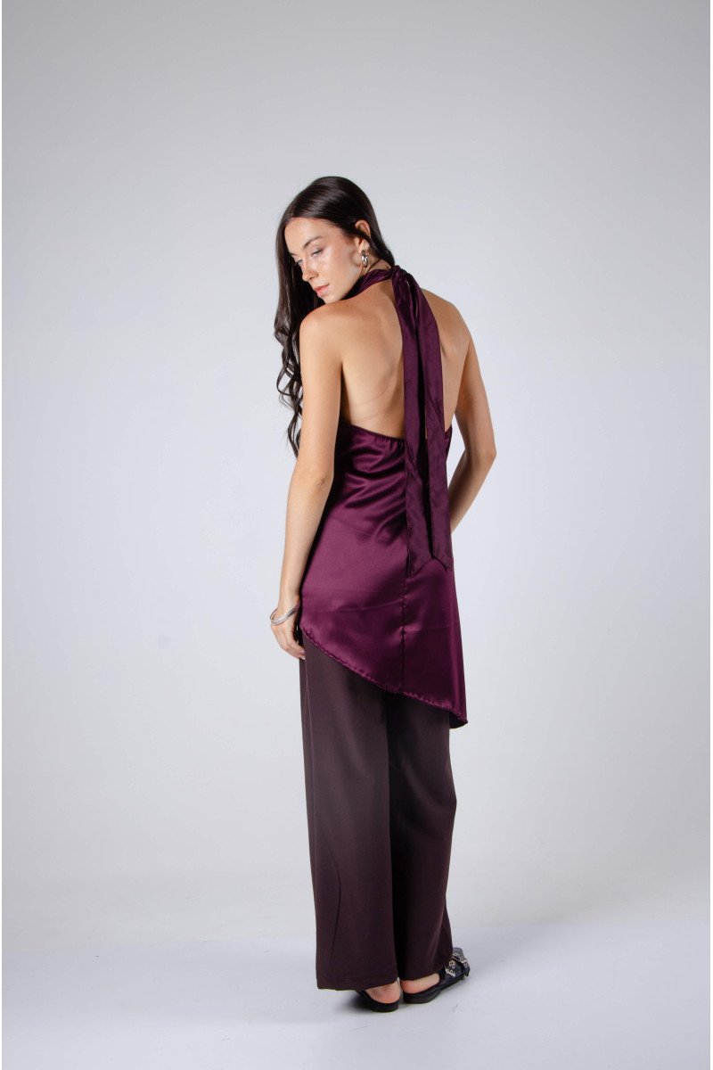 Blusa de satén evasé escote halter con lazo, espalda baja y terminación asimétrica